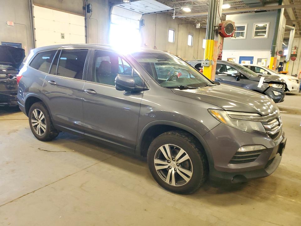 Снимка 4 от търг – 2016 HONDA PILOT с VIN 5FNYF6H85GB017614