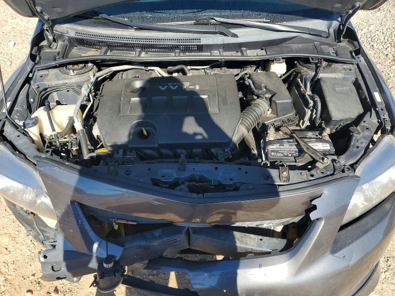 Снимка 11 от търг – 2009 TOYOTA COROLLA с VIN 1NXBU40E99Z058173