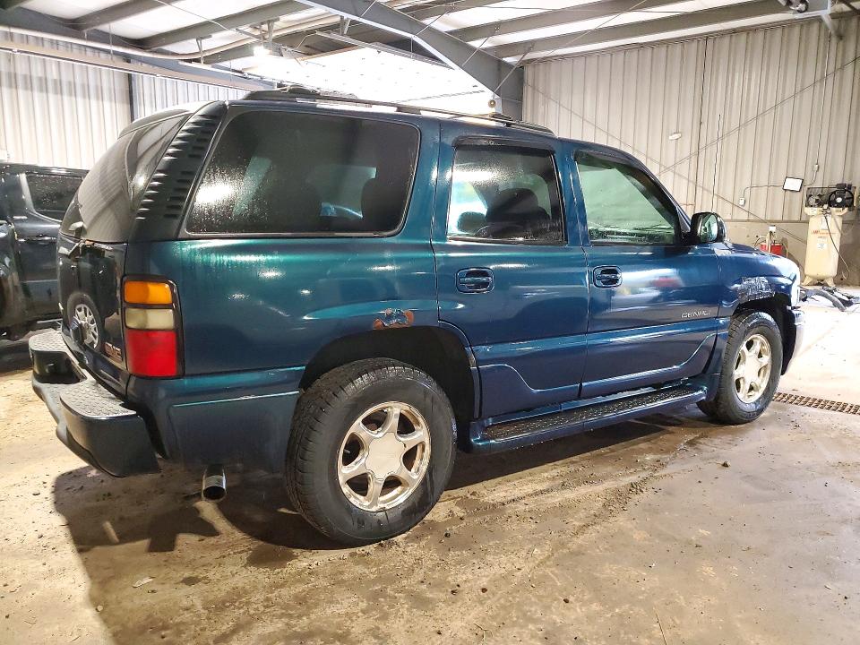 Снимка 3 от търг – 2005 GMC YUKON с VIN 1GKEK63U25J218531