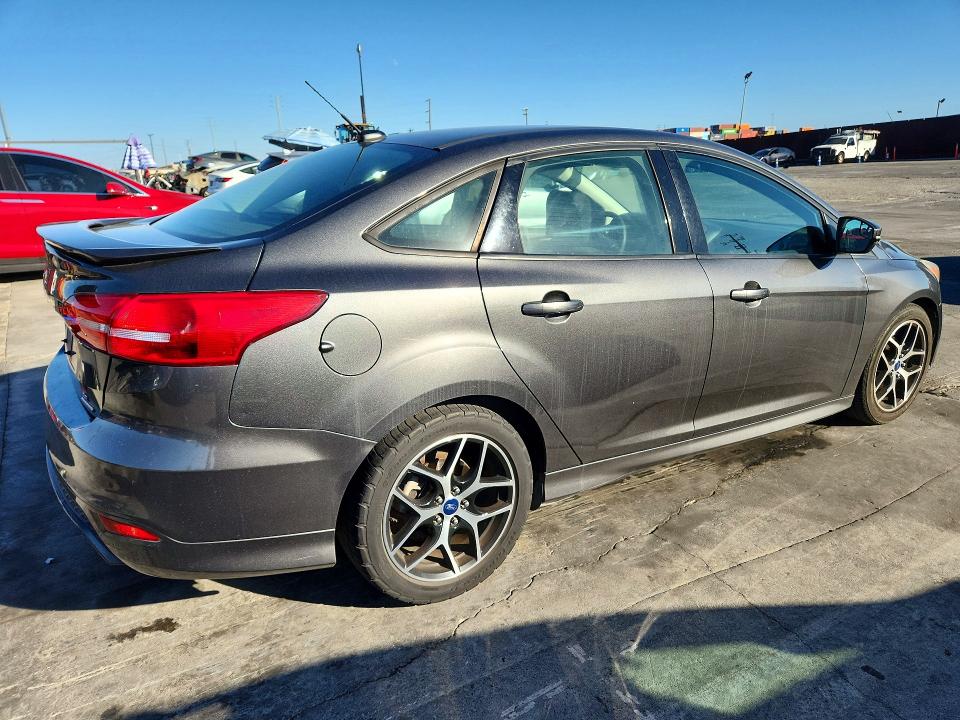 Фото 3 с аукциона – 2016 FORD FOCUS с VIN 1FADP3F25GL357731