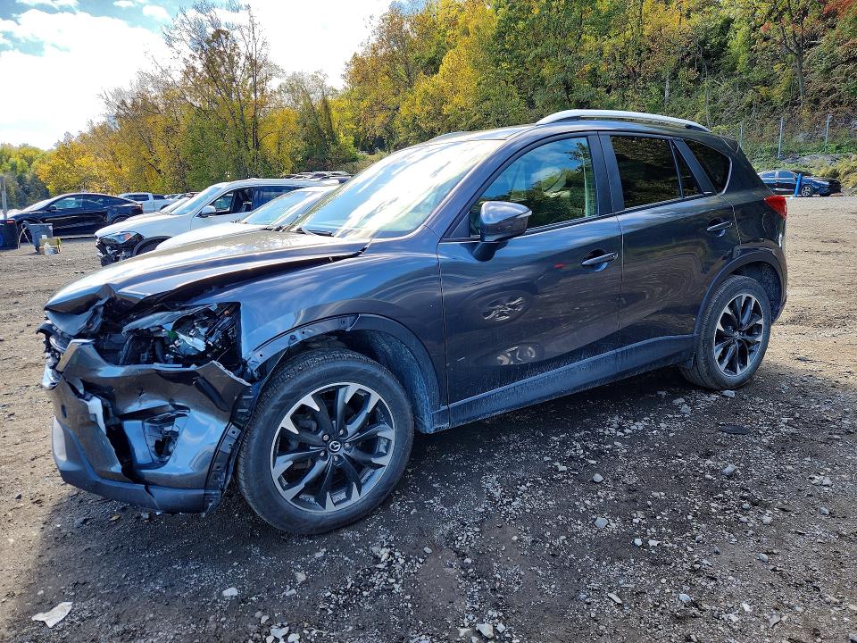 MAZDA CX-5 2016 with VIN JM3KE4DY9G0705799 - Photo from auction