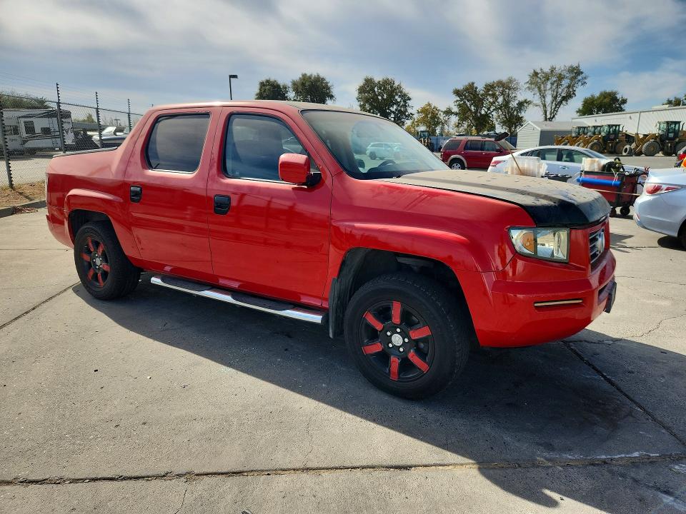 Снимка 4 от търг – 2006 HONDA RIDGELINE с VIN 2HJYK16286H537405