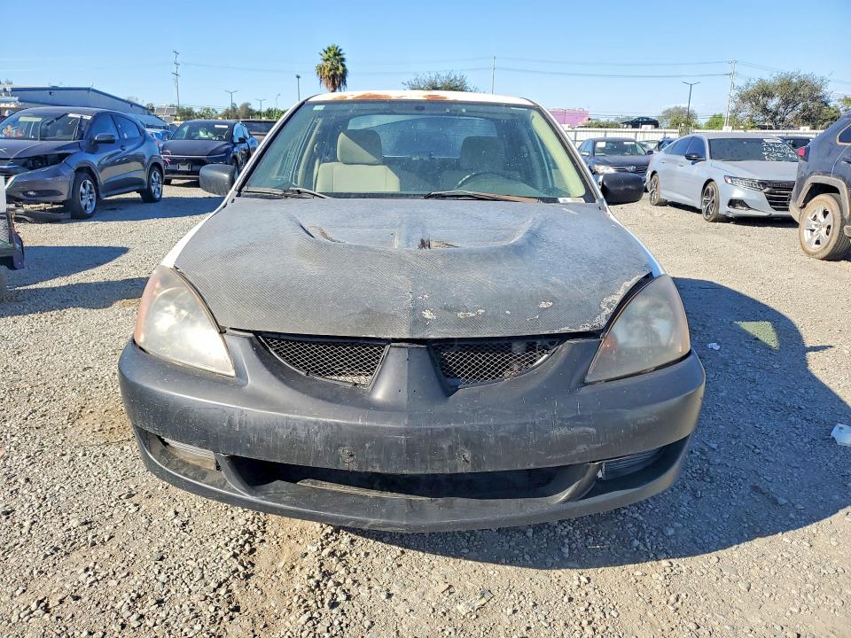 Photo 5 from auction – 2006 MITSUBISHI LANCER with VIN JA3AJ26E96U050525