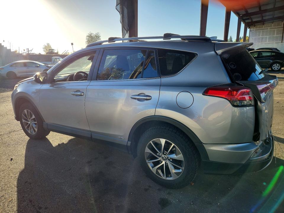 Снимка 2 от търг – 2018 TOYOTA RAV4 HYBRID с VIN JTMRJREV0JD211707