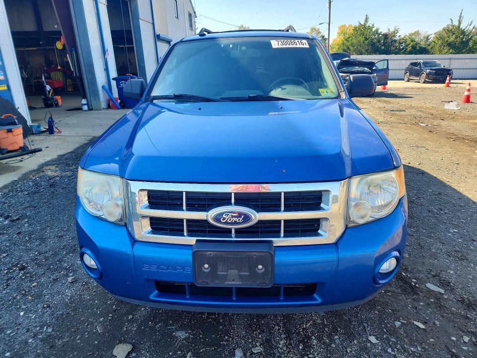 Снимка 5 от търг – 2011 FORD ESCAPE с VIN 1FMCU0D70BKC35851