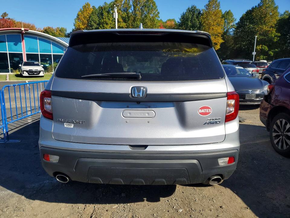 Photo 6 from auction – 2021 HONDA PASSPORT with VIN 5FNYF8H22MB006430