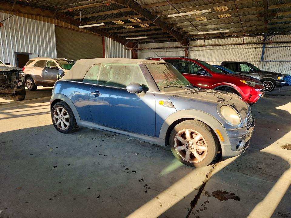Фото 4 с аукциона – 2010 MINI COOPER с VIN WMWMR3C52ATZ18782
