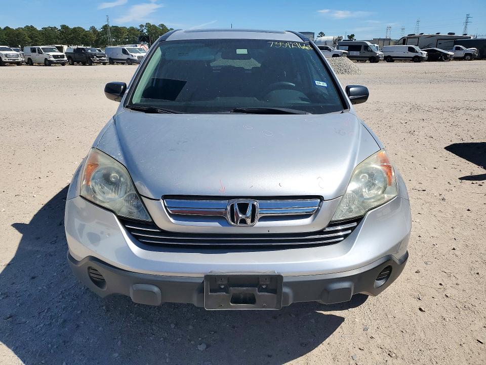 Снимка 5 от търг – 2009 HONDA CR-V с VIN 3CZRE385X9G703053