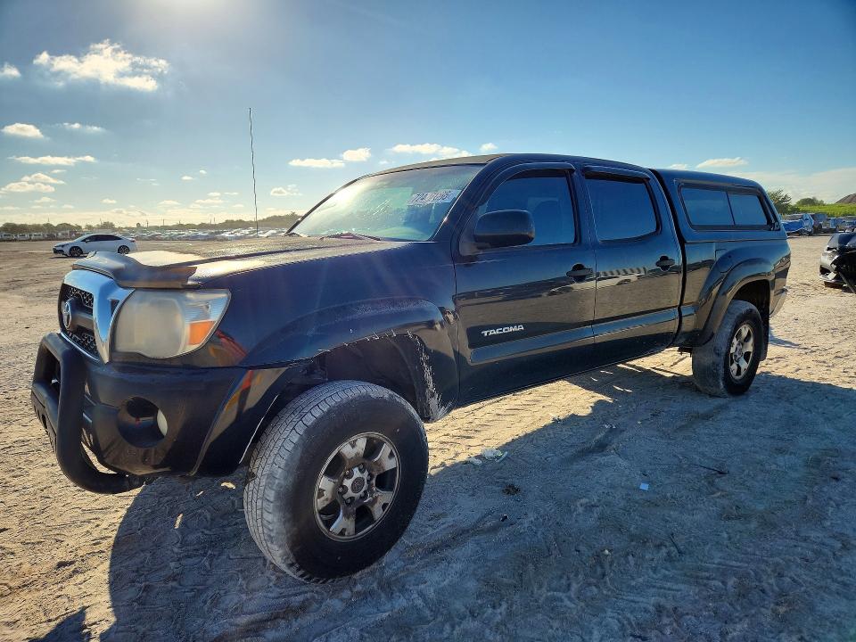 TOYOTA TACOMA 2011 с VIN 3TMMU4FN0BM035637 - Снимка от търг