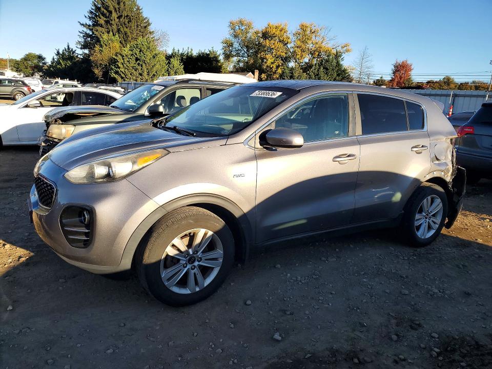 KIA SPORTAGE 2017 с VIN KNDPMCAC1H7292287 - Снимка от търг