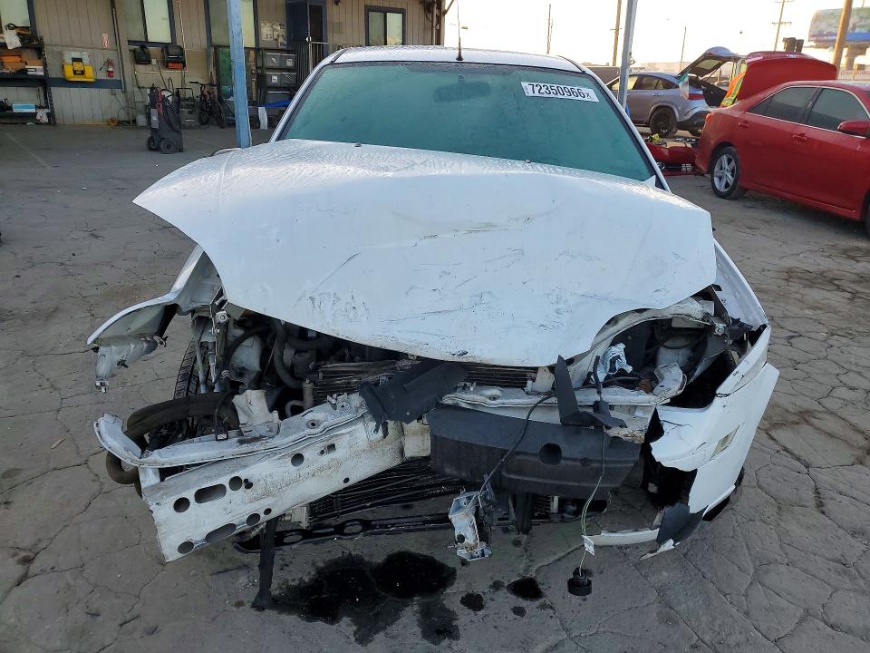 Photo 5 from auction – 2006 FORD FOCUS with VIN 1FAHP34N06W130619