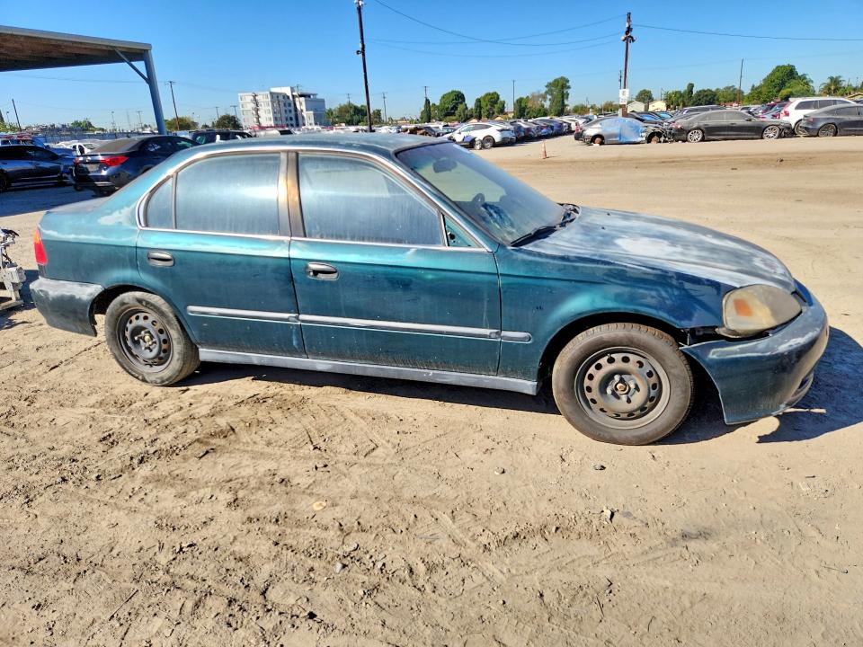 Снимка 4 от търг – 1999 HONDA CIVIC с VIN JHMEJ6576XS000934