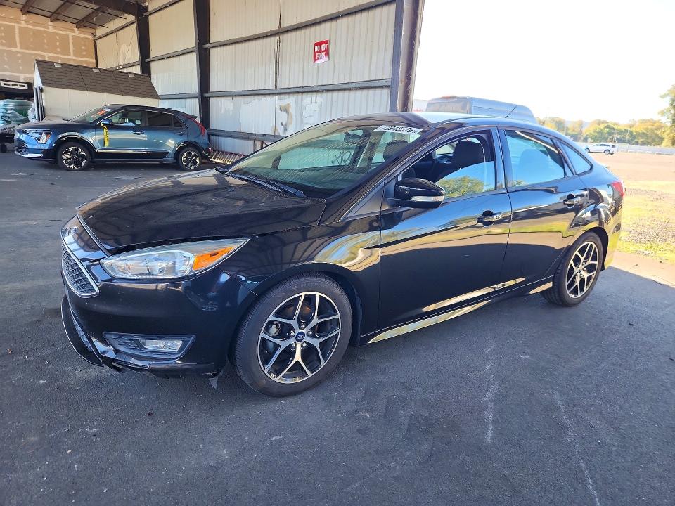 FORD FOCUS 2015 с VIN 1FADP3F22FL364117 - Снимка от търг