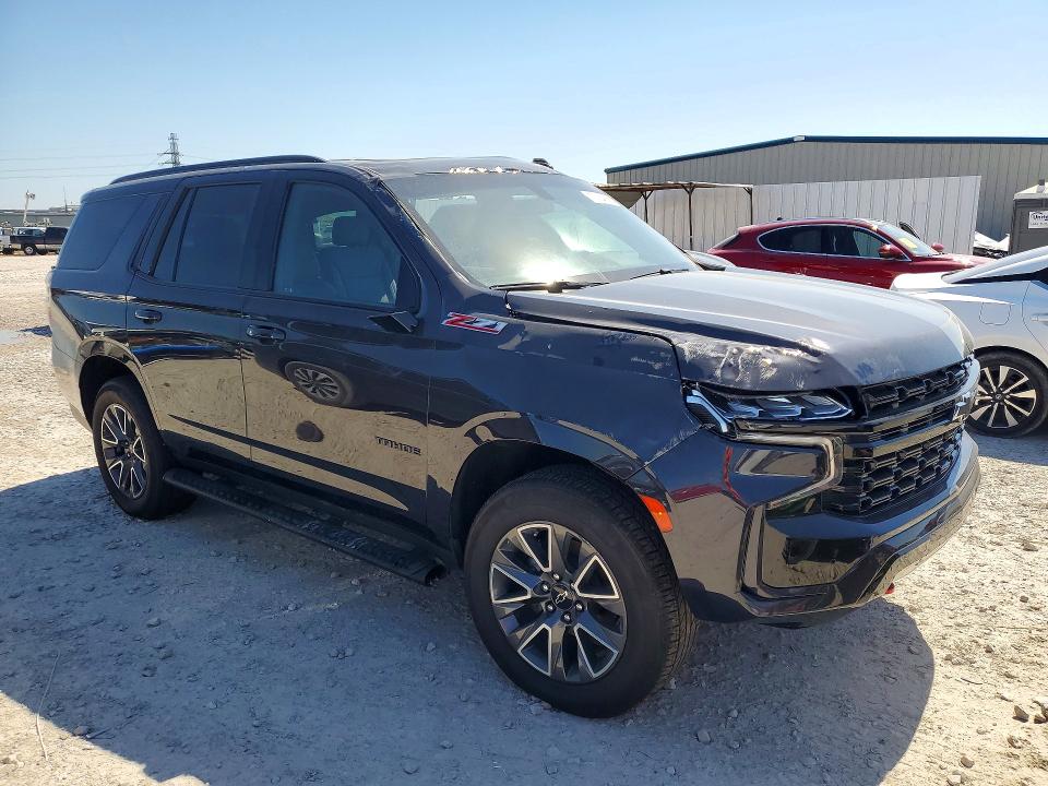 Photo 4 from auction – 2023 CHEVROLET TAHOE with VIN 1GNSKPKD8PR294501