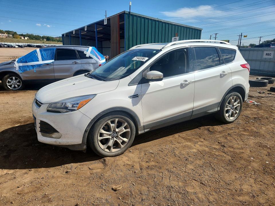 FORD ESCAPE 2014 with VIN 1FMCU9JX3EUE19649 - Photo from auction