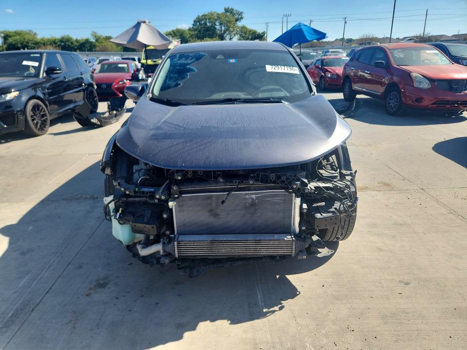 Photo 5 from auction – 2018 HONDA CR-V with VIN 5J6RW1H57JA011580