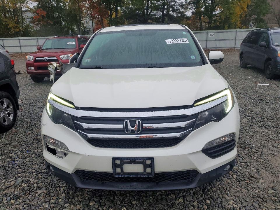Photo 5 from auction – 2016 HONDA PILOT with VIN 5FNYF6H70GB072852