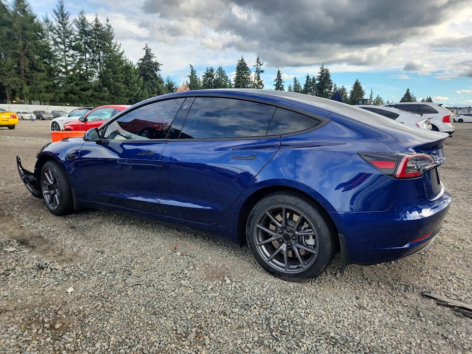Снимка 2 от търг – 2023 TESLA MODEL 3 с VIN 5YJ3E1EB0PF387417