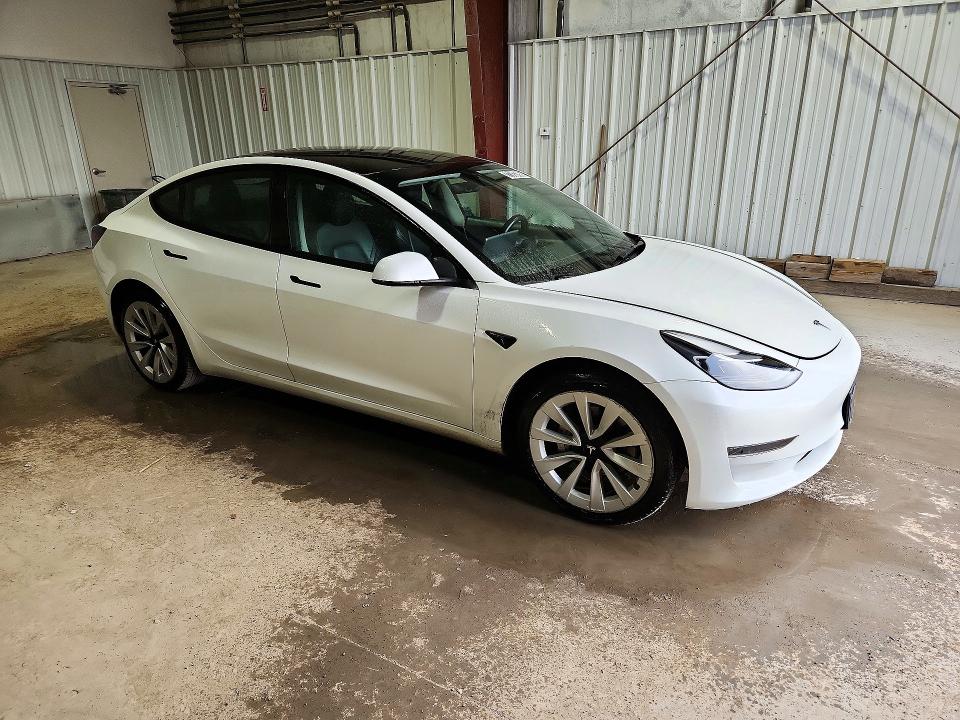 Снимка 4 от търг – 2023 TESLA MODEL 3 с VIN 5YJ3E1EA4PF435248