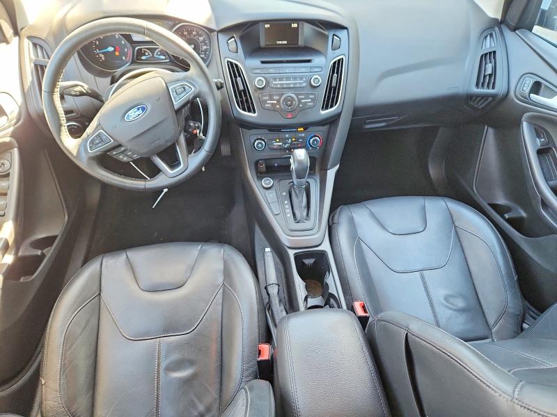 Снимка 8 от търг – 2015 FORD FOCUS с VIN 1FADP3K22FL323265