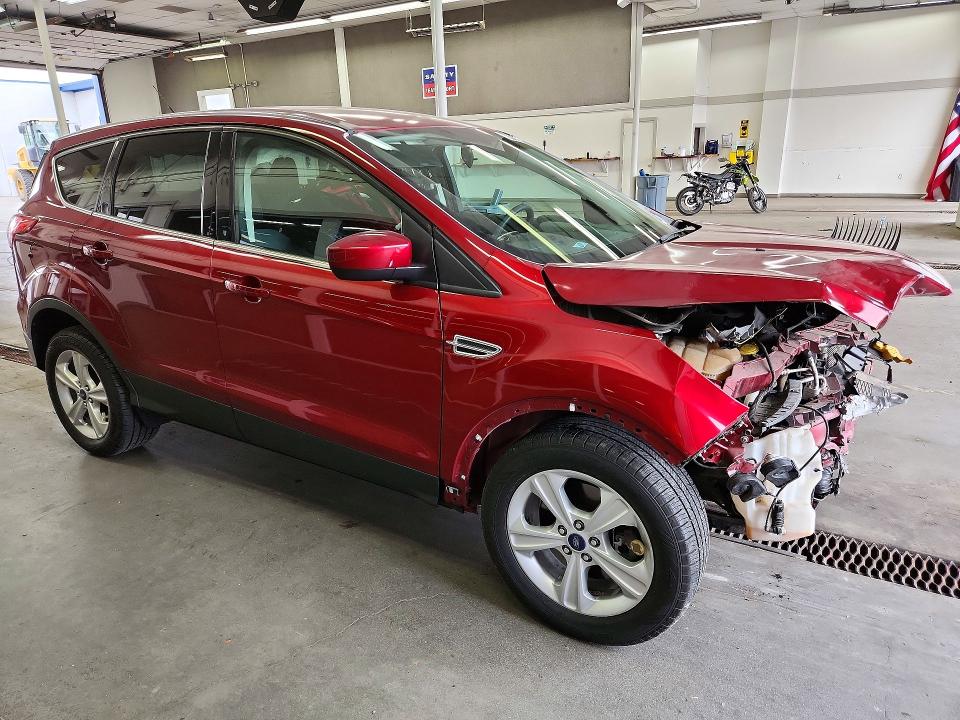 Photo 4 from auction – 2014 FORD ESCAPE with VIN 1FMCU9G92EUB01904