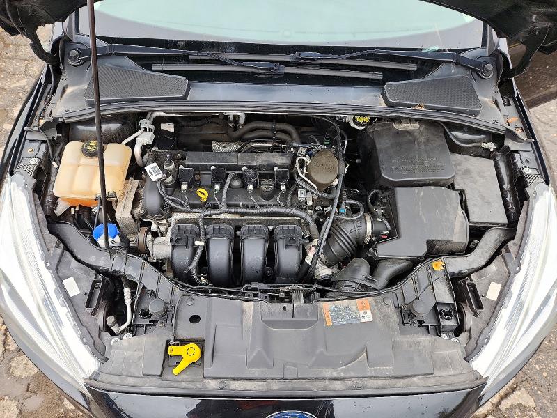 Фото 11 с аукциона – 2015 FORD FOCUS с VIN 1FADP3N24FL323179