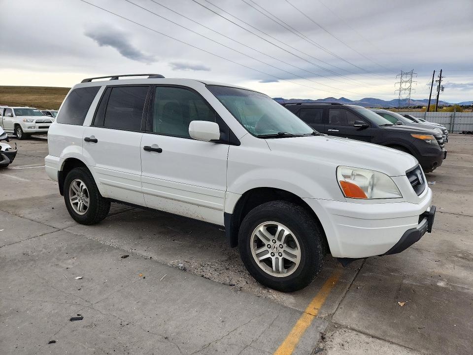 Фото 4 с аукциона – 2004 HONDA PILOT с VIN 2HKYF184X4H611502