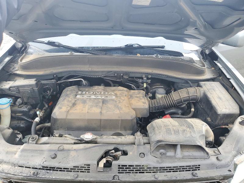 Снимка 12 от търг – 2007 HONDA RIDGELINE с VIN 2HJYK16507H547325
