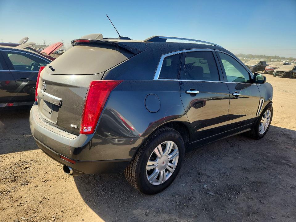 Снимка 3 от търг – 2016 CADILLAC SRX с VIN 3GYFNEE31GS510379