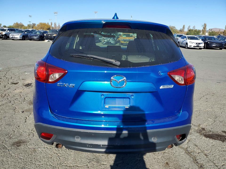 Photo 6 from auction – 2014 MAZDA CX-5 with VIN JM3KE2BE9E0373969