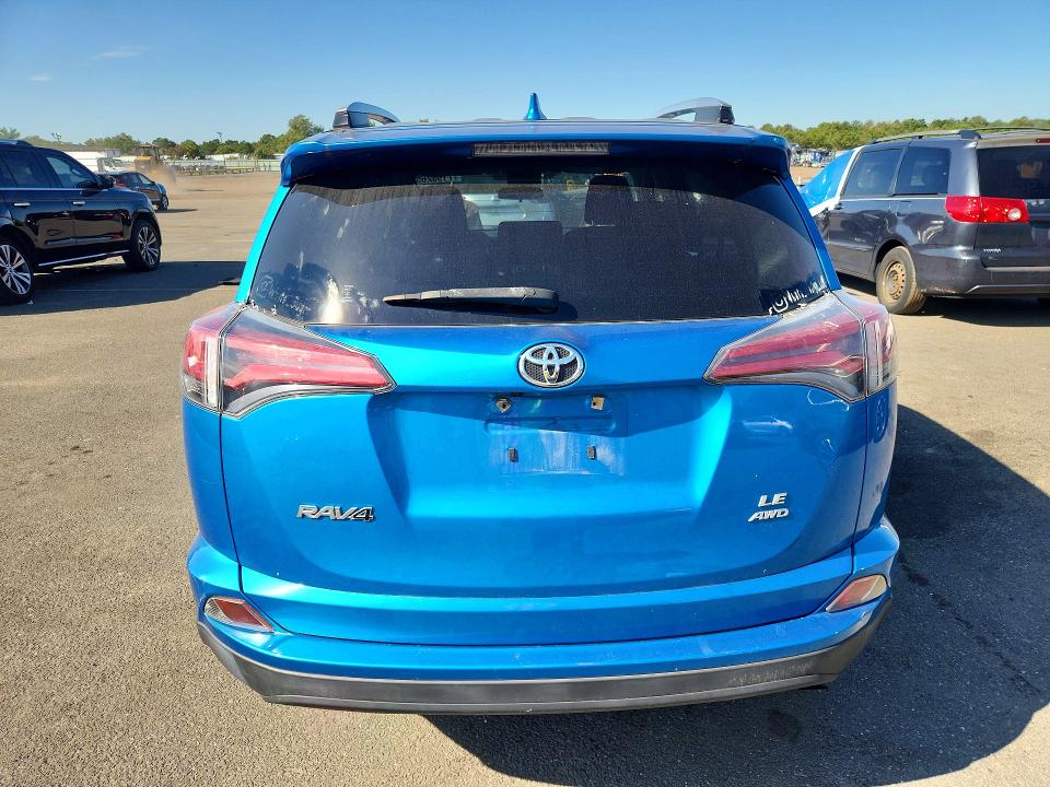 Photo 6 from auction – 2016 TOYOTA RAV4 with VIN JTMBFREV8GD184073