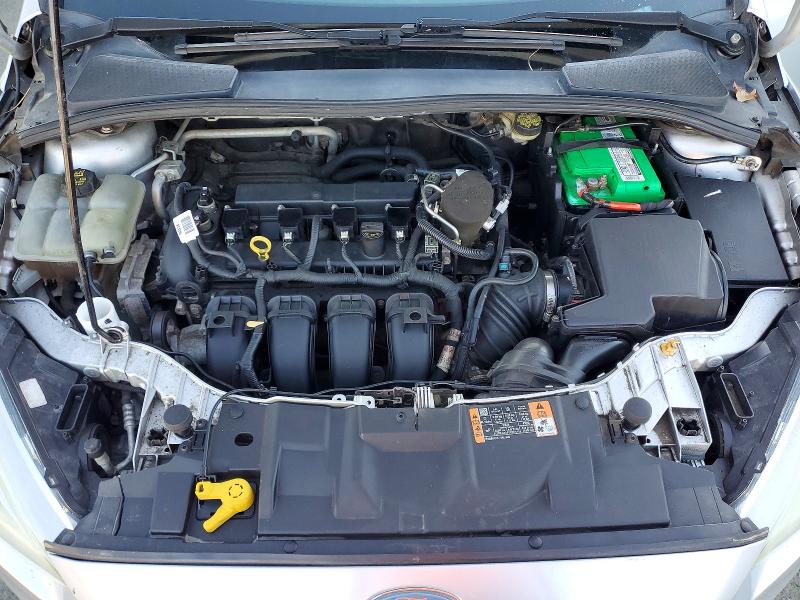 Снимка 11 от търг – 2015 FORD FOCUS с VIN 1FADP3E21FL301978
