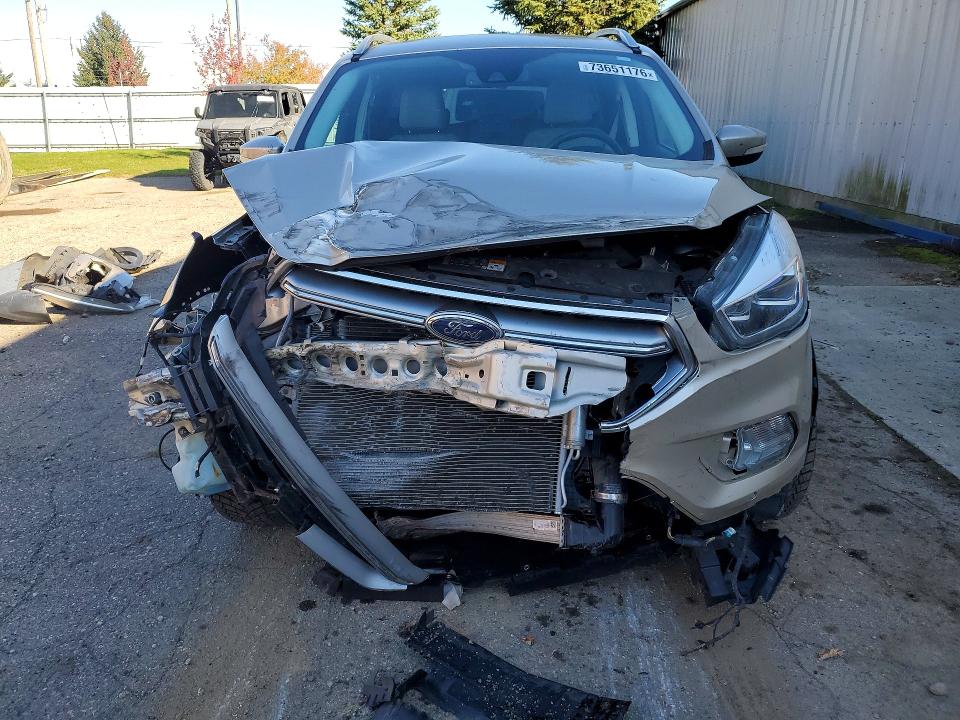 Photo 5 from auction – 2017 FORD ESCAPE with VIN 1FMCU9J97HUE25816