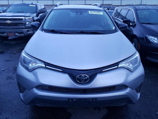 Photo 5 from auction – 2018 TOYOTA RAV4 LE with VIN 2T3ZFREV7JW422908