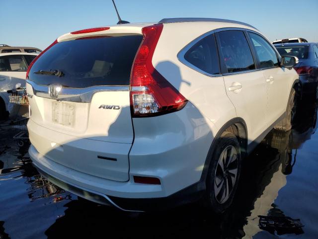 Photo 3 from auction – 2015 HONDA CR-V TOURI with VIN 5J6RM4H91FL062224