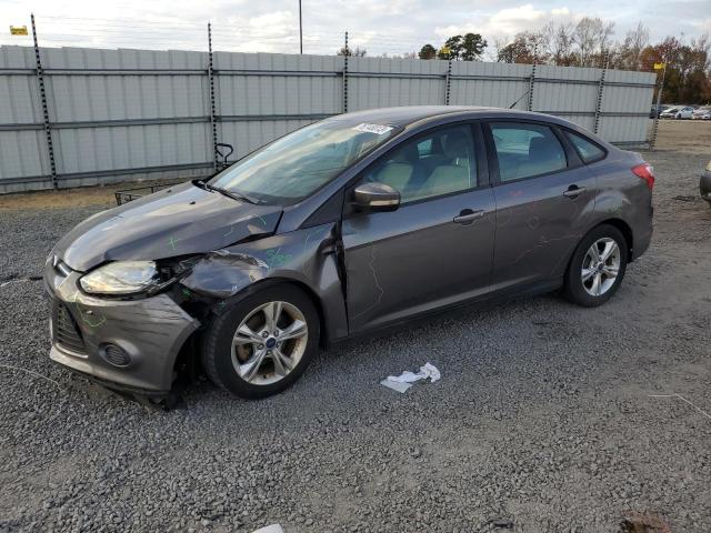 FORD FOCUS SE 2014 with VIN 1FADP3F21EL319989 - Photo from auction