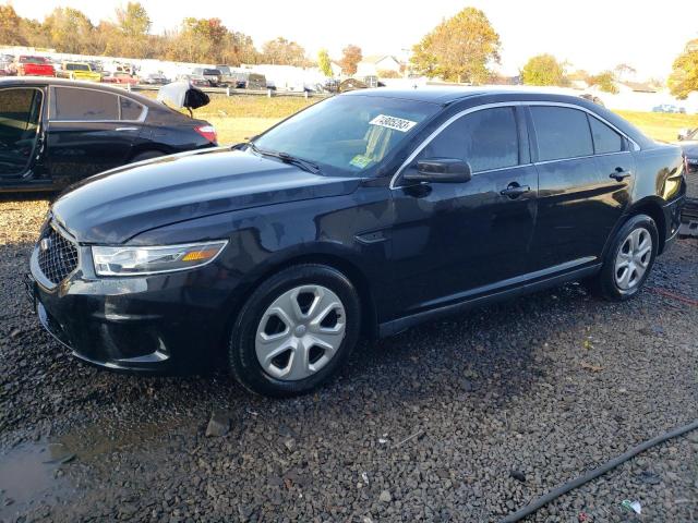 FORD TAURUS POL 2014 with VIN 1FAHP2MK7EG185531 - Photo from auction