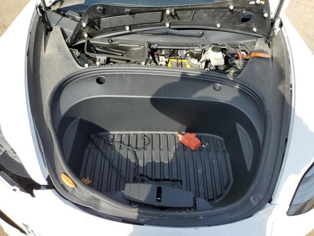 Photo 11 from auction – 2022 TESLA MODEL 3 with VIN 5YJ3E1EB4NF138762