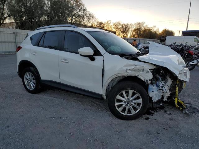 Photo 4 from auction – 2014 MAZDA CX-5 SPORT with VIN JM3KE2BE9E0369730