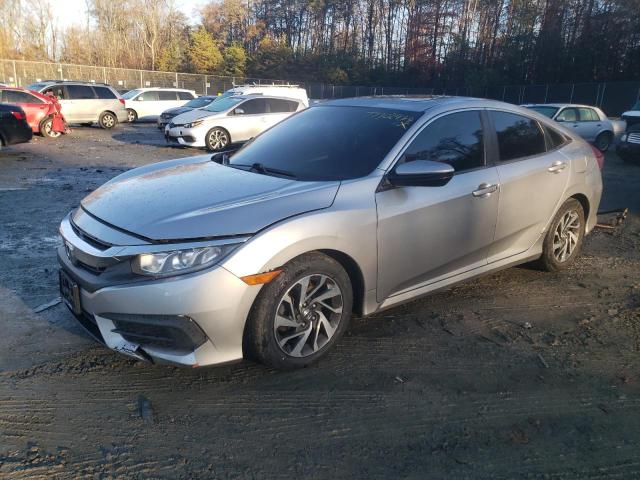 HONDA CIVIC EX 2017 with VIN 19XFC2F71HE031052 - Photo from auction