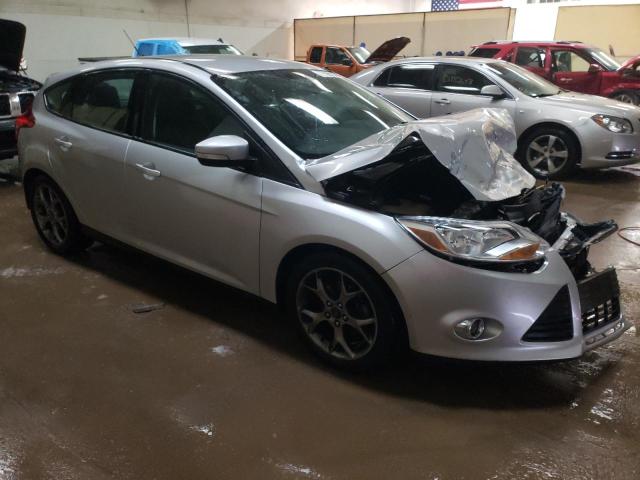 Foto 4 de la subasta – 2014 FORD FOCUS SE con VIN 1FADP3K29EL258946
