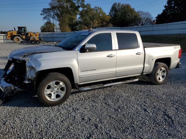 CHEVROLET SILVERADO 2018 with VIN 3GCUKREC9JG124137 - Photo from auction