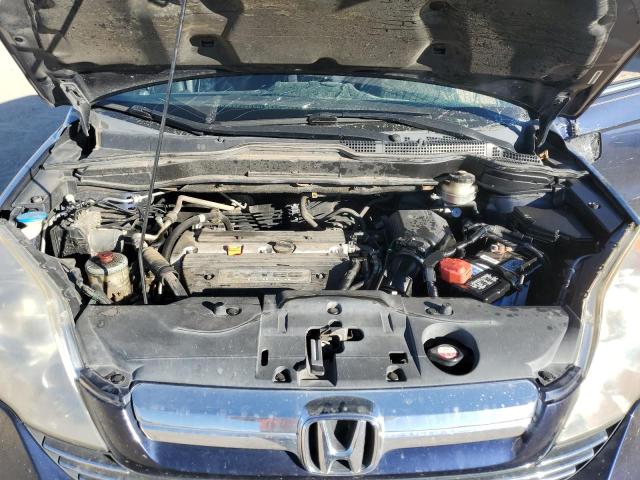 Photo 11 from auction – 2007 HONDA CR-V EX with VIN JHLRE385X7C076444
