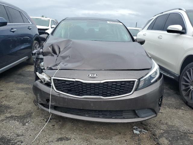 Photo 5 from auction – 2018 KIA FORTE LX with VIN 3KPFL4A70JE174115