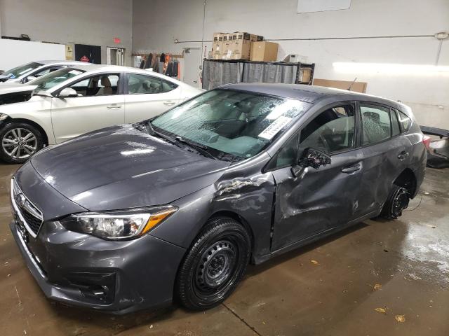 SUBARU IMPREZA 2018 with VIN 4S3GTAA63J3716101 - Photo from auction
