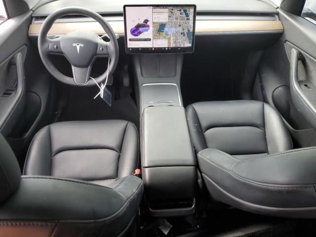 Photo 8 from auction – 2021 TESLA MODEL Y with VIN 5YJYGAEEXMF145658