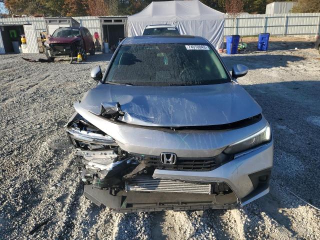Photo 5 from auction – 2023 HONDA CIVIC EX with VIN 2HGFE1F75PH320220