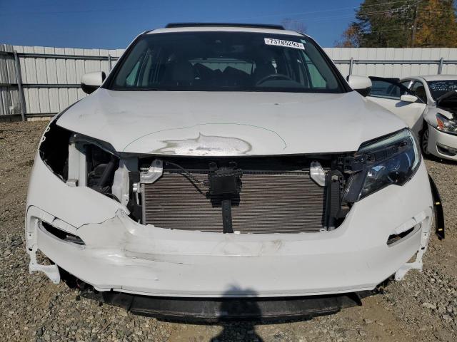 Photo 5 from auction – 2021 HONDA PILOT EXL with VIN 5FNYF5H52MB006999