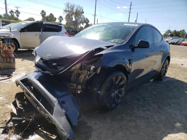 TESLA MODEL Y 2023 with VIN 7SAYGDEE9PA044939 - Photo from auction