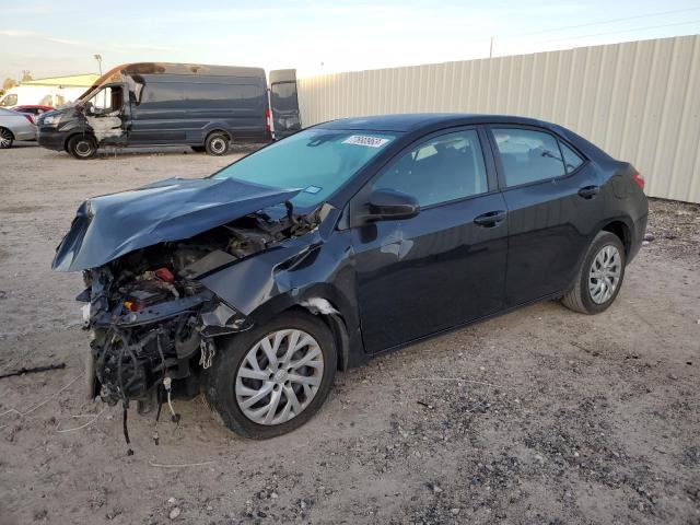 TOYOTA COROLLA L 2018 with VIN 5YFBURHE3JP771951 - Photo from auction